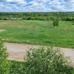 Расчищенная луговиина напротив музея Рубцова